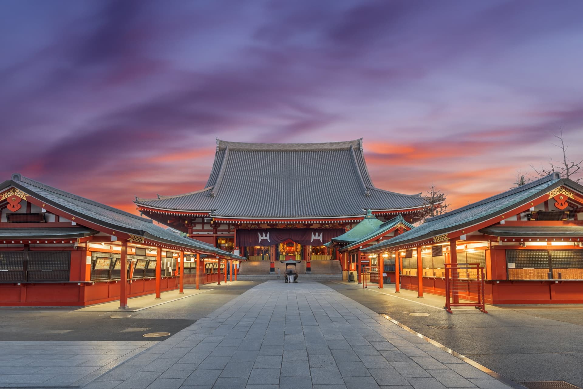 Traditional Japanese Buddhist temple with vibrant autumn colors and pagoda architecture - perfect for goshuin collection